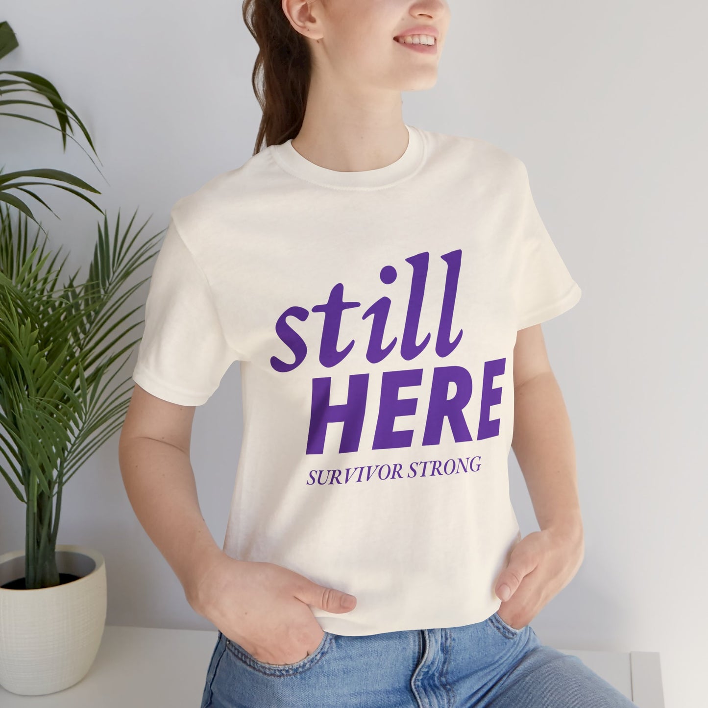 Still Here Tee – Survivor Strong Edition