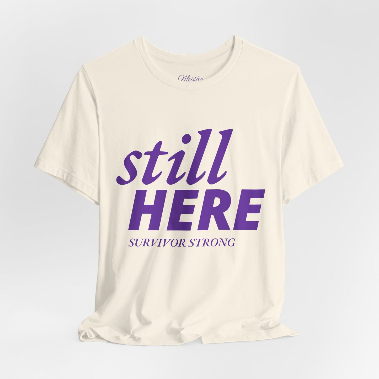 Still Here Tee – Survivor Strong Edition