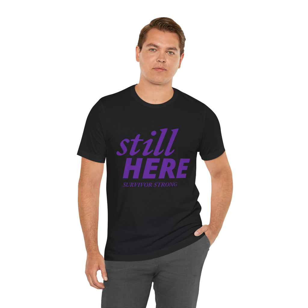 Still Here Tee – Survivor Strong Edition