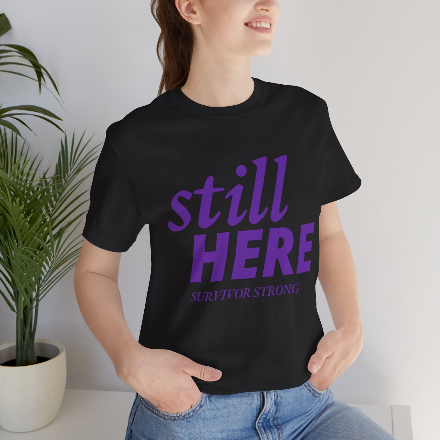Still Here Tee – Survivor Strong Edition