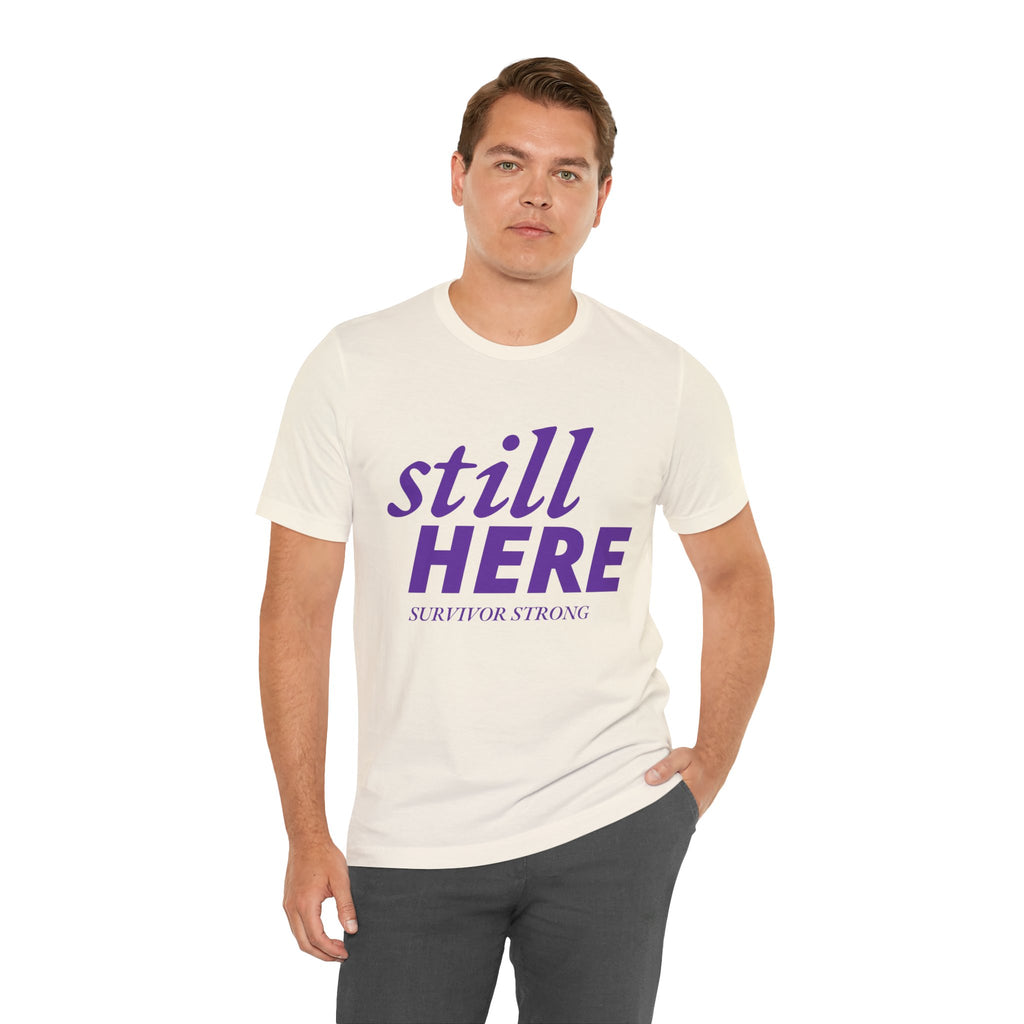 Still Here Tee – Survivor Strong Edition